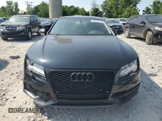 2012 Audi A7 Prestige с VIN WAU2GAFC7CN071874, выставлен на аукционе Copart как лот 61005675 с пробегом 159 046 миль миль и Чистый • Clean title. История ставок и продаж доступна на DreamBid. Изображение 5.