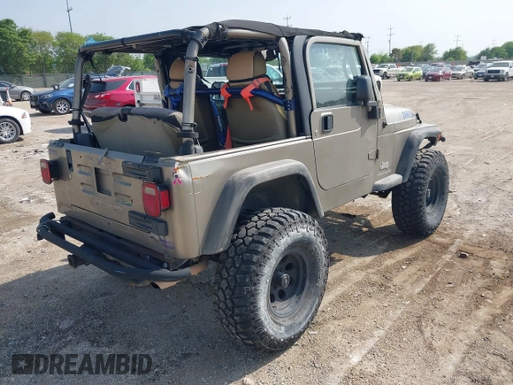 2005 Jeep Wrangler SE with VIN 1J4FA29S25P328827, listed as a IAAI auction lot 41917807 with 157,562 mi miles. Bid and sale history available at carsss.com. Image 4.