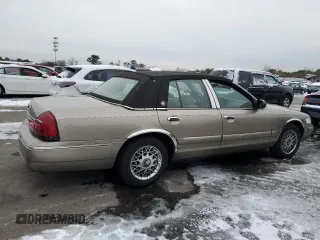 2001 Mercury Grand Marquis GS z VIN 2MEFM74W11X701900, wystawiony jako Copart lot #41913965 z przebiegiem 79 360 mil mil oraz Czysty tytuł • Clean title. Historia ofert i sprzedaży dostępna na DreamBid. Obrazek 3.