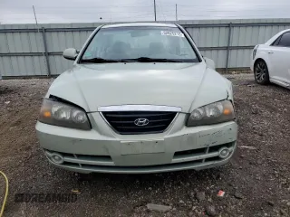 2004 Hyundai Elantra GLS z VIN KMHDN46D14U861749, wystawiony jako Copart lot #52625215 z przebiegiem 130 063 mil mil oraz Szkoda całkowita • Salvage title. Historia ofert i sprzedaży dostępna na DreamBid. Obrazek 5.