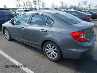 2012 Honda Civic EX-L with VIN 2HGFB2F94CH307646, listed as a IAAI auction lot 42006923 with 260,917 mi miles and . Bid and sale history available at DreamBid. Image 3.