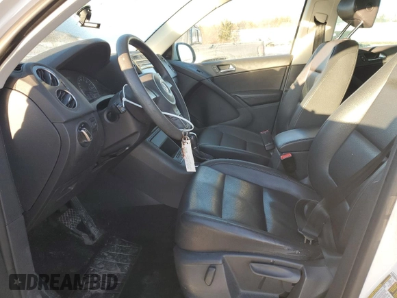 2012 Volkswagen Tiguan LE with VIN WVGAV7AXXCW568697, listed as a Copart auction lot 43210435 with 181,249 mi miles and Salvage title. Bid and sale history available at DreamBid. Image 7.