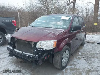 2019 Dodge Grand Caravan SE with VIN 2C4RDGBG2KR591214, listed as a IAAI auction lot 41094167 with 149,981 mi miles. Bid and sale history available at carsss.com. Image 2.