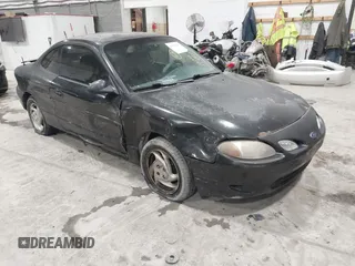1998 Ford Escort ZX2 Cool z VIN 3FAKP1135WR269029, wystawiony jako IAAI lot #41558166 z przebiegiem 138 194 mil mil oraz . Historia ofert i sprzedaży dostępna na DreamBid. Obrazek 1.