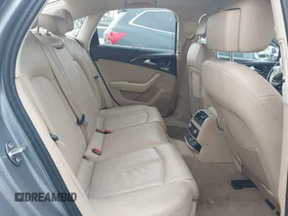 2015 Audi A6 Premium Plus z VIN WAUGFAFC6FN009203, wystawiony jako IAAI lot #42242726 z przebiegiem 69 163 mil mil oraz . Historia ofert i sprzedaży dostępna na DreamBid. Obrazek 8.