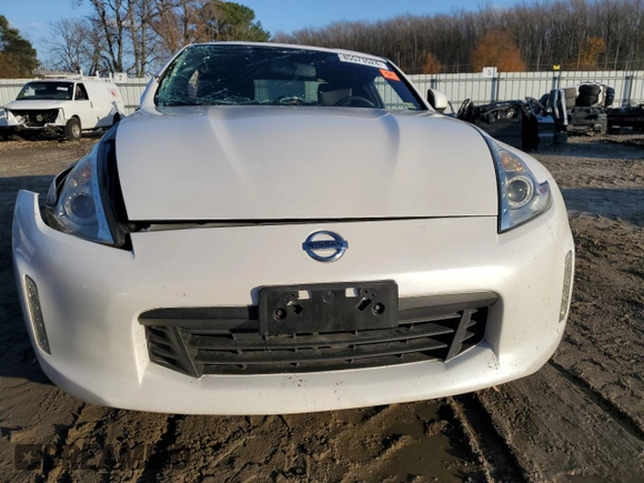 2014 Nissan 370Z Touring with VIN JN1AZ4EH8EM631324, listed as a Copart auction lot 85573524 with 0 mi miles and Salvage Title. Bid and sale history available at carsss.com. Image 5.