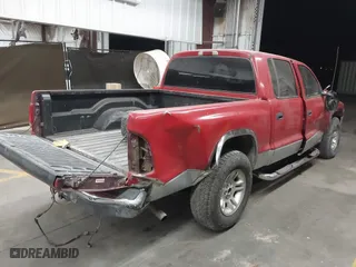 2001 Dodge Dakota Sport with VIN 1B7HL2AN81S296293, listed as a IAAI auction lot 41470036 with 203,323 mi miles. Bid and sale history available at carsss.com. Image 4.