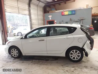 2013 Hyundai Accent GL with VIN KMHCT5AE6DU122559, listed as a IAAI auction lot 41800714 with 129,582 mi miles. Bid and sale history available at carsss.com. Image 14.