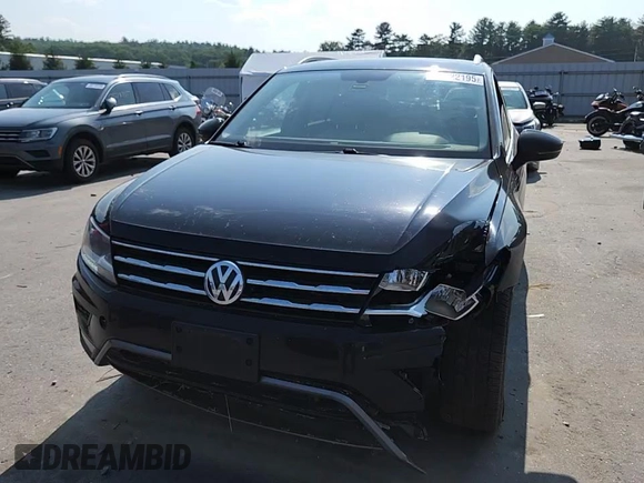 2018 Volkswagen Tiguan SEL with VIN 3VV2B7AX5JM015388, listed as a Copart auction lot 60222195 with 121,389 mi miles and Salvage title. Bid and sale history available at DreamBid. Image 14.