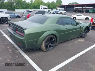 2021 Dodge Challenger R/T Scat Pack z VIN 2C3CDZFJ2MH559741, wystawiony jako IAAI lot #42264991 z przebiegiem 51 040 mil mil oraz . Historia ofert i sprzedaży dostępna na DreamBid. Obrazek 4.