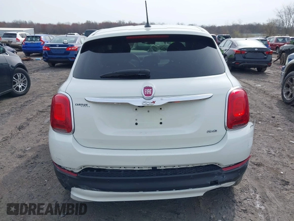2016 FIAT 500X Lounge z VIN ZFBCFYDT0GP328541, wystawiony jako IAAI lot #42016388 z przebiegiem 134 806 mil mil oraz . Historia ofert i sprzedaży dostępna na DreamBid. Obrazek 16.