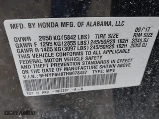 2017 Honda Pilot Touring with VIN 5FNYF6H97HB078487, listed as a IAAI auction lot 41676341 with 105,176 mi miles. Bid and sale history available at carsss.com. Image 9.