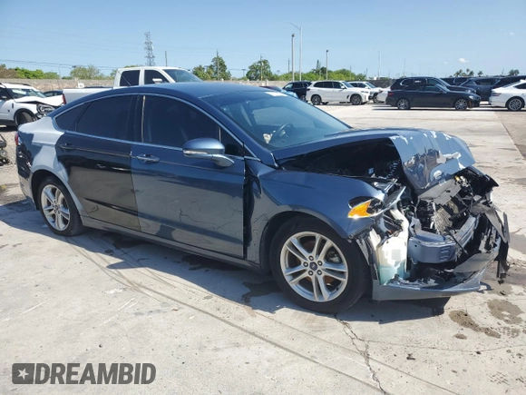 2018 Ford Fusion SE z VIN 3FA6P0HD7JR180095, wystawiony jako Copart lot #55980745 z przebiegiem 76 994 mil mil oraz Czysty tytuł • Clean title. Historia ofert i sprzedaży dostępna na DreamBid. Obrazek 4.