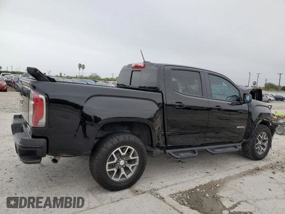 2022 GMC Canyon 4WD AT4 w/Leather with VIN 1GTG6FEN2N1294071, listed as a Copart auction lot 84652954 with 53,076 mi miles and Salvage Title. Bid and sale history available at carsss.com. Image 3.