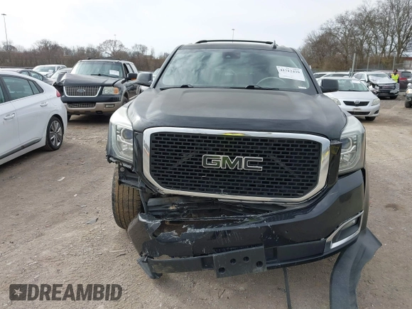 2016 GMC Yukon SLT with VIN 1GKS1BKC3GR272738, listed as a IAAI auction lot 41712439 with 169,726 mi miles. Bid and sale history available at carsss.com. Image 6.