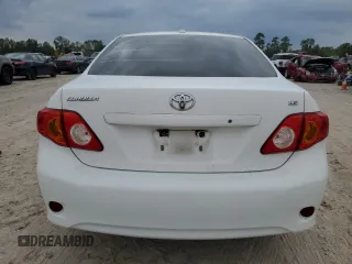 2010 Toyota Corolla with VIN 1NXBU4EE7AZ256666, listed as a Copart auction lot 79097074 with 65,537 mi miles and Salvage title. Bid and sale history available at DreamBid. Image 6.