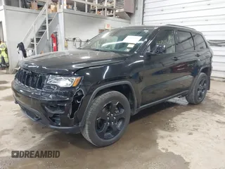 2021 Jeep Grand Cherokee Laredo X with VIN 1C4RJFAG5MC817567, listed as a IAAI auction lot 42297526 with 71,387 mi miles and . Bid and sale history available at DreamBid. Image 17.