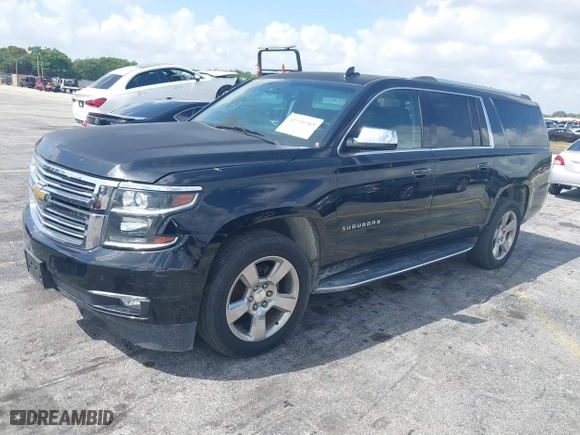 2017 Chevrolet Suburban Premier with VIN 1GNSCJKC4HR127667, listed as a IAAI auction lot 41936945 with 139,006 mi miles. Bid and sale history available at carsss.com. Image 2.