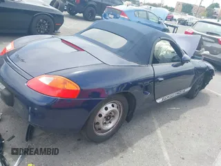 2002 Porsche Boxster z VIN WP0CA29872U623464, wystawiony jako IAAI lot #42234674 z przebiegiem 91 254 mil mil oraz . Historia ofert i sprzedaży dostępna na DreamBid. Obrazek 4.