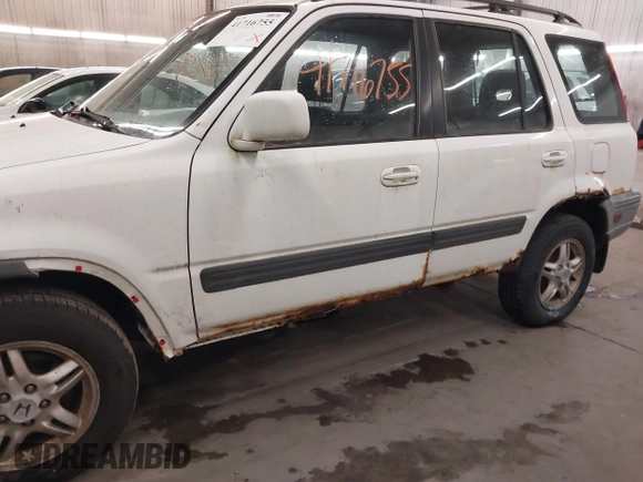 2000 Honda CR-V EX with VIN JHLRD186XYC023471, listed as a IAAI auction lot 41716755 with 335,641 mi miles. Bid and sale history available at carsss.com. Image 6.