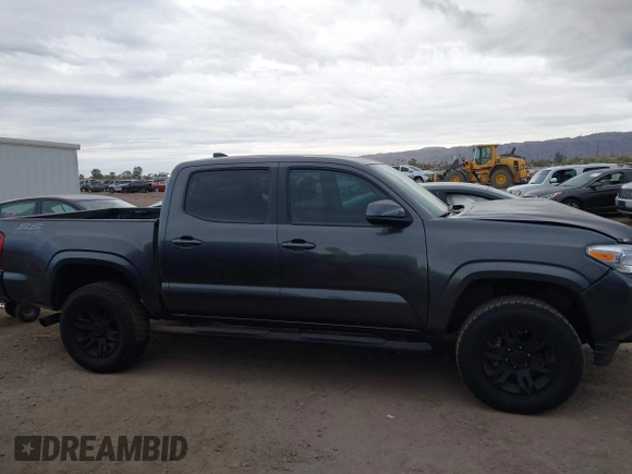 2022 Toyota Tacoma SR with VIN 3TYAX5GN8NT066318, listed as a IAAI auction lot 41739981 with 50,186 mi miles and . Bid and sale history available at DreamBid. Image 13.