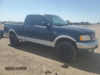 2001 Ford F-150 XL with VIN 1FTRX18L71NA27627, listed as a Copart auction lot 64190715 with 105,503 mi miles and Salvage title. Bid and sale history available at DreamBid. Image 4.
