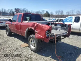 2002 Ford Ranger XL Fleet with VIN 1FTZR45E12TA11258, listed as a Copart auction lot 46797715 with 219,473 mi miles and Salvage Title. Bid and sale history available at DreamBid. Image 2.