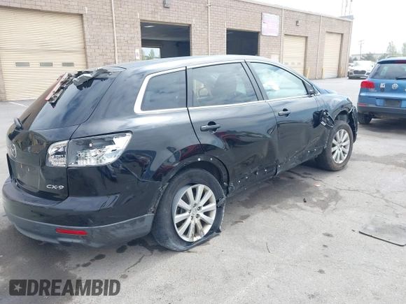 2010 Mazda CX-9 Grand Touring with VIN JM3TB2MV1A0203416, listed as a IAAI auction lot 42090500 with 131,659 mi miles and . Bid and sale history available at carsss.com. Image 4.
