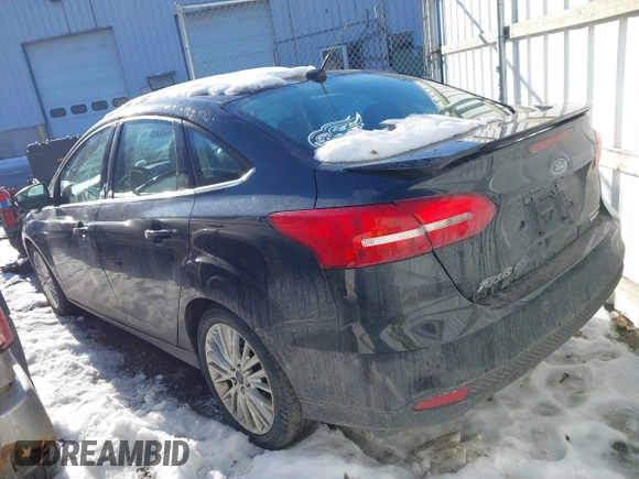 2015 Ford Focus Titanium with VIN 1FADP3J22FL323185, listed as a IAAI auction lot 41461154 with 125,477 mi miles and . Bid and sale history available at carsss.com. Image 3.