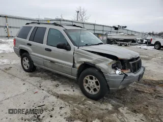 2000 Jeep Grand Cherokee Laredo z VIN 1J4GW48S8YC335926, wystawiony jako Copart lot #80693454 z przebiegiem 353 635 mil mil oraz Nie do naprawy • Non repairable. Historia ofert i sprzedaży dostępna na DreamBid. Obrazek 4.