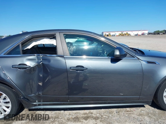 2013 Cadillac CTS Luxury with VIN 1G6DE5E5XD0146158, listed as a IAAI auction lot 42531205 with 130,669 mi miles and . Bid and sale history available at DreamBid. Image 14.