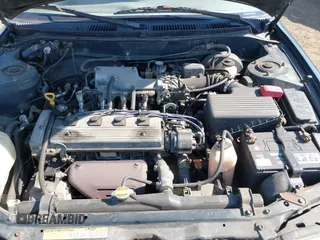 1997 Toyota Corolla with VIN 1NXBA02E7VZ601593, listed as a IAAI auction lot 42771723 with 247,823 mi miles and . Bid and sale history available at DreamBid. Image 6.