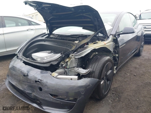 2023 Tesla Model 3 with VIN 5YJ3E1EA7PF642913, listed as a IAAI auction lot 41898249 with 26,394 mi miles. Bid and sale history available at carsss.com. Image 6.