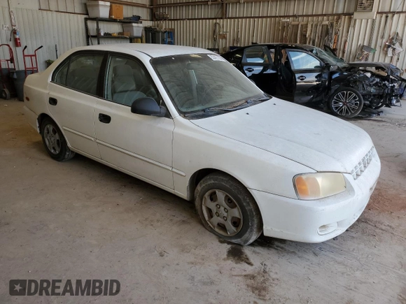 2002 Hyundai Accent GL with VIN KMHCG45C82U380280, listed as a Copart auction lot 79087254 with 173,764 mi miles and Clean Title. Bid and sale history available at carsss.com. Image 4.