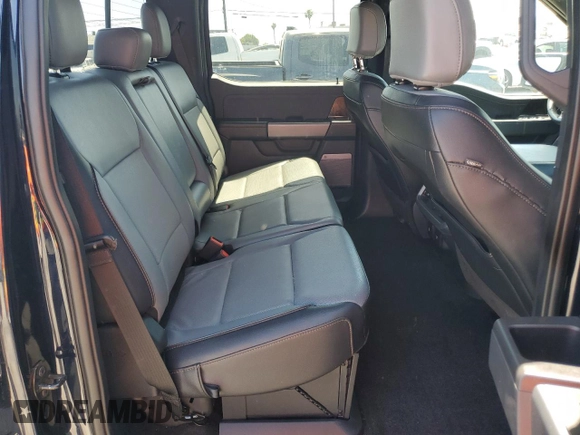 2022 Ford F-150 Lightning Pro z VIN 1FT6W1EV8NWG04113, wystawiony jako Copart lot #57489635 z przebiegiem 48 990 mil mil oraz Szkoda całkowita • Salvage title. Historia ofert i sprzedaży dostępna na DreamBid. Obrazek 10.