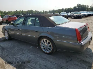 2007 Cadillac DTS V8 z VIN 1G6KD57Y67U136984, wystawiony jako Copart lot #65570084 z przebiegiem 114 814 mil mil oraz Szkoda całkowita • Salvage title. Historia ofert i sprzedaży dostępna na DreamBid. Obrazek 2.