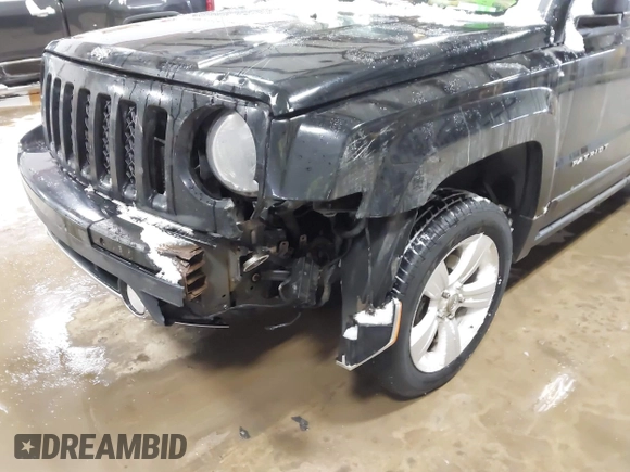 2014 Jeep Patriot Limited with VIN 1C4NJRCB8ED910340, listed as a IAAI auction lot 41396065 with 241,669 mi miles. Bid and sale history available at carsss.com. Image 6.