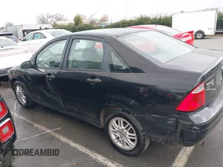 2005 Ford Focus S with VIN 1FAFP34N75W304479, listed as a IAAI auction lot 41117405 with 234,312 mi miles. Bid and sale history available at carsss.com. Image 14.