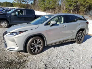 2021 Lexus RX with VIN JTJHGKFA3M2019630, listed as a Copart auction lot 88920335 with 77,826 mi miles and Clean Title. Bid and sale history available at carsss.com. Image 1.