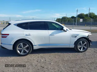 2023 Genesis GV80 with VIN KMUHCESCXPU106714, listed as a IAAI auction lot 41899438 with 35,750 mi miles and . Bid and sale history available at DreamBid. Image 13.