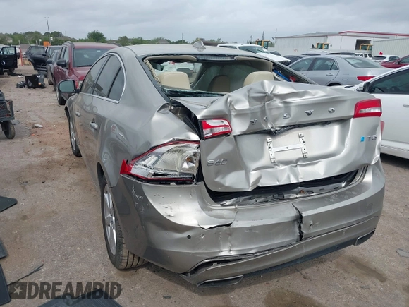 2016 Volvo S60 T5 Drive-E Premier with VIN YV126MFK0G2414153, listed as a IAAI auction lot 41931477 with 75,792 mi miles. Bid and sale history available at carsss.com. Image 3.