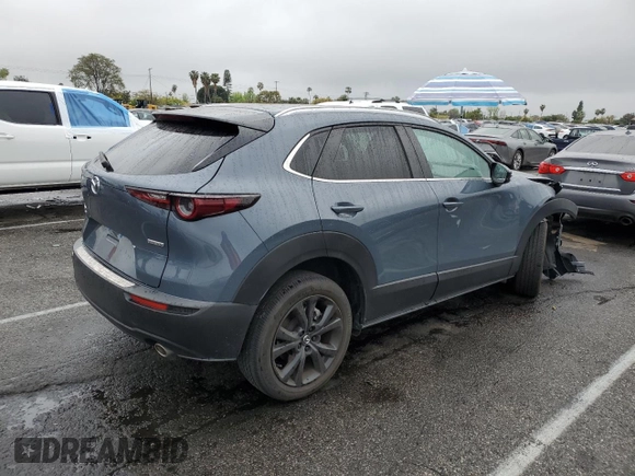 2023 Mazda CX-30 2.5 S Carbon Edition with VIN 3MVDMBCMXPM542809, listed as a Copart auction lot 51134315 with 21,279 mi miles and Salvage Title. Bid and sale history available at carsss.com. Image 3.