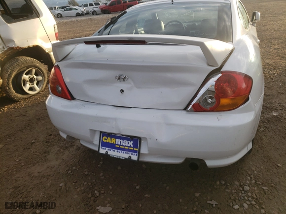 2004 Hyundai Tiburon GT with VIN KMHHN65F84U116609, listed as a Copart auction lot 89343225 with 162,133 mi miles and Salvage Title. Bid and sale history available at carsss.com. Image 9.