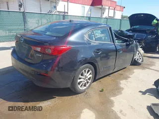 2015 Mazda Mazda3 i Touring with VIN 3MZBM1V77FM126870, listed as a IAAI auction lot 40547647 with 146,901 mi miles. Bid and sale history available at carsss.com. Image 4.