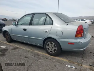 2004 Hyundai Accent GL with VIN KMHCG45C34U567915, listed as a Copart auction lot 43654985 with 141,461 mi miles and Clean Title. Bid and sale history available at carsss.com. Image 2.