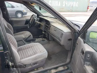 1994 Jeep Grand Cherokee Laredo with VIN 1J4GZ58S2RC118838, listed as a IAAI auction lot 42047224 with 160,715 mi miles. Bid and sale history available at carsss.com. Image 5.