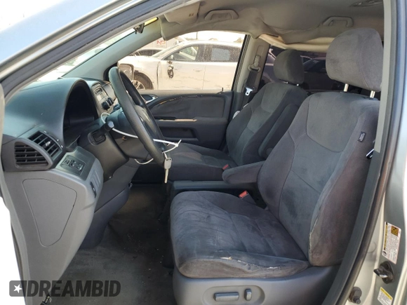 2005 Honda Odyssey EX with VIN 5FNRL38405B099581, listed as a Copart auction lot 52970815 with 218,225 mi miles and Salvage Title. Bid and sale history available at carsss.com. Image 7.