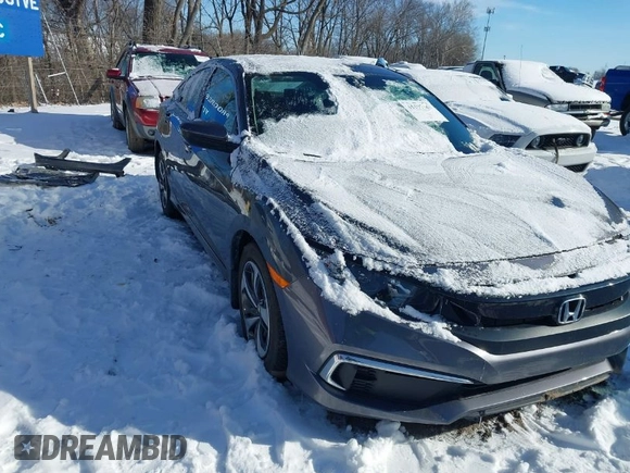2020 Honda Civic LX z VIN 2HGFC2F64LH580766, wystawiony jako IAAI lot #41597161 z przebiegiem 10 828 mil mil oraz . Historia ofert i sprzedaży dostępna na DreamBid. Obrazek 1.
