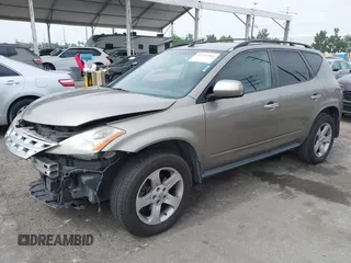 2004 Nissan Murano SL z VIN JN8AZ08T54W224915, wystawiony jako IAAI lot #42447585 z przebiegiem 170 929 mil mil oraz . Historia ofert i sprzedaży dostępna na DreamBid. Obrazek 2.