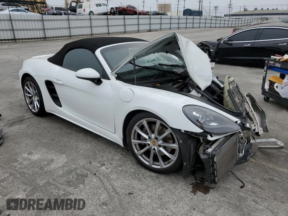 2019 Porsche 718 Boxster z VIN WP0CA2A80KS211040, wystawiony jako Copart lot #76409354 z przebiegiem 27 669 mil mil oraz Szkoda całkowita • Salvage title. Historia ofert i sprzedaży dostępna na DreamBid. Obrazek 4.